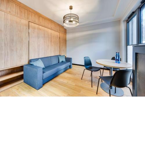 Black & Blue by OneApartments