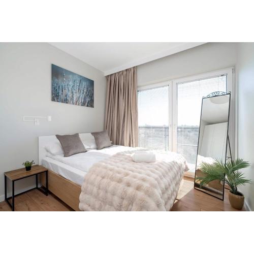 Bright Apartment Bulgarska with Parking near ENEA Stadium by Noclegi Renters