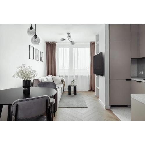 Bright Apartment Close to PGE with Parking by Noclegi Renters
