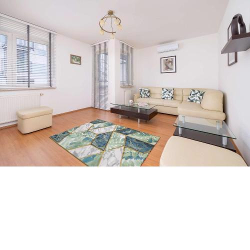 Bright Apartment near ICE Kraków with Air Conditioning and Parking by Noclegi Renters
