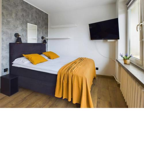 Bright Studio in Downtown Warsaw by Noclegi Renters