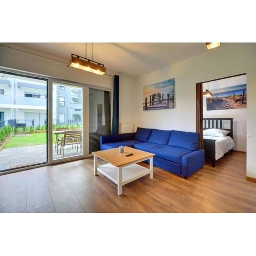 Bright Sun Seasons 24 Apartments in Pogorzelica Close to the Beach with Parking and Balcony by Noclegi Renters