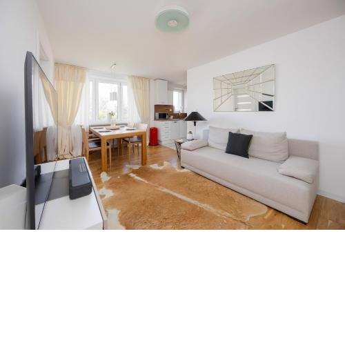 Bright Two-Bedroom Apartment by Noclegi Renters