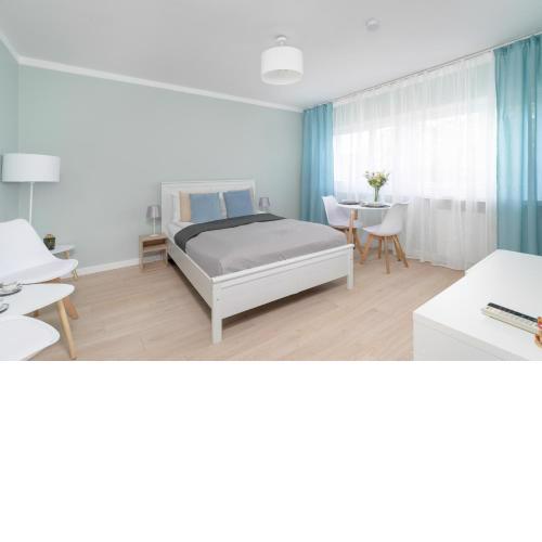 Bukowska Elegancki Apartament z 1 Sypialnią i Biurkiem by Noclegi Renters