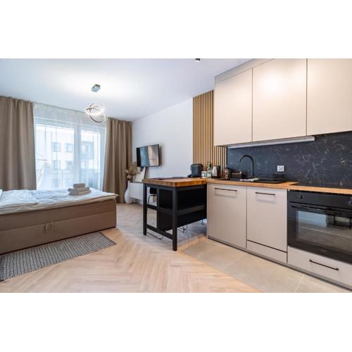 Ceglana Modena Park Apartment by BookingHost