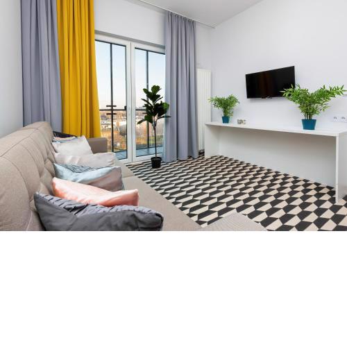 Central Business District Warsaw Apartments by Noclegi Renters