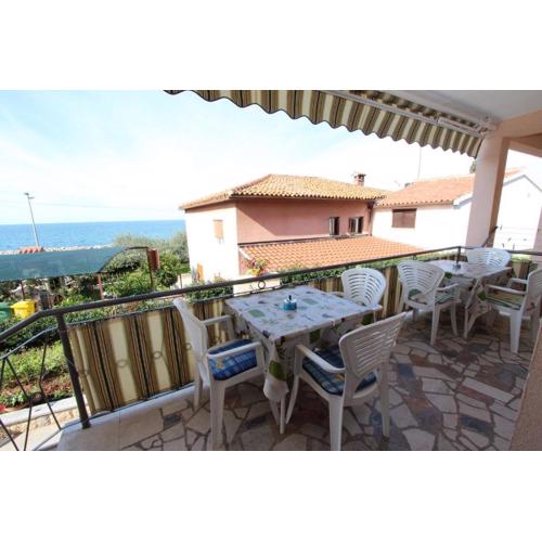 Charmantes Apartment nur 400 Meter zum Strand mit Meerblick, Grillbereich, Klima, WiFi