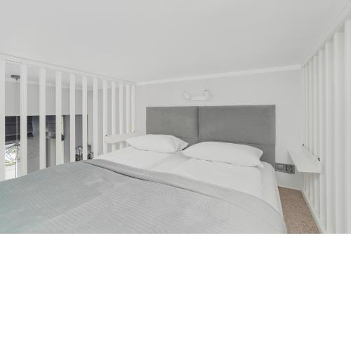 Charming and Modern Studio with Mezzanine in Poznan Center by Noclegi Renters