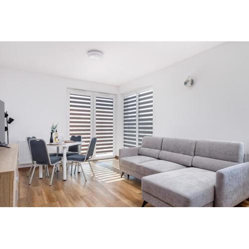 Coast Breeze Stylish Apartment by Noclegi Renters