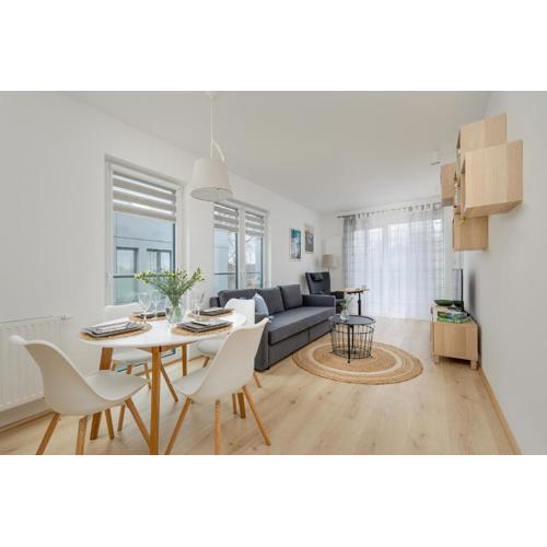 Cosy and Bright Apartment in Dźwirzyno with Furnished Balcony and Free Parking by Noclegi Renters