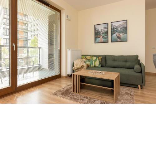 Cosy Apartment Białej Floty with Parking by Noclegi Renters