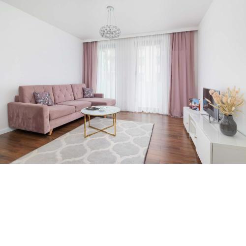 Cosy & Bright Apartment with Parking on the Cystersów Street by Noclegi Renters