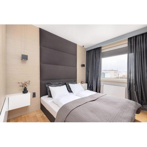 Cozy Apartment in the City Center by Noclegi Renters