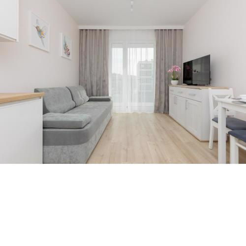 Cozy Apartment Łopuszańska by Noclegi Renters