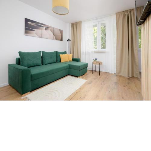 Cozy Apartment near Royal Baths Park by Noclegi Renters