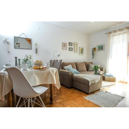 Cozy Retreat with Parking, Balconies & Garden Fireplace