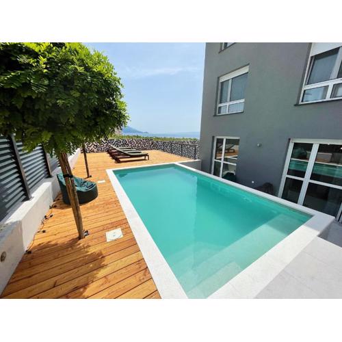 Cozy seaside apartment with pool & terrace