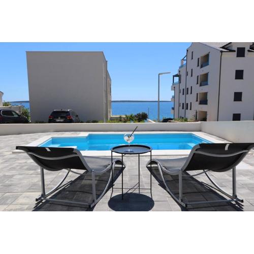 Dolphin view II with a pool by the beach
