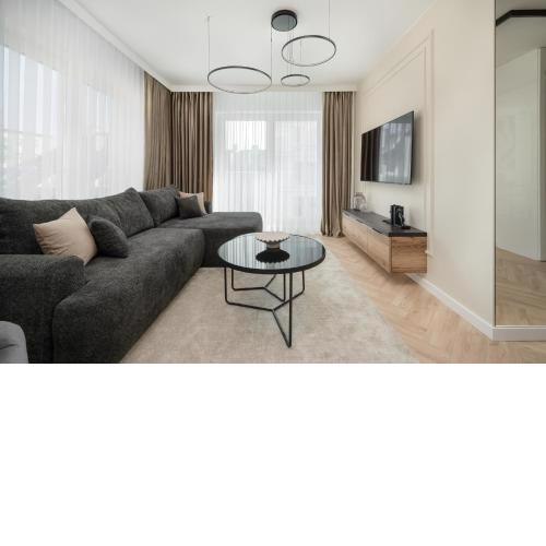 Elegancki Apartament z Parkingiem Blisko Starego Miasta by Noclegi Renters
