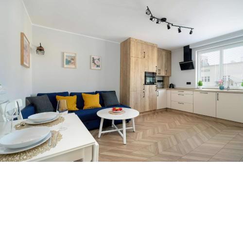 Elegancki i Przytulny Apartament z Balkonem w Poznaniu by Noclegi Renters