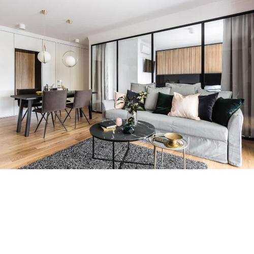 Elegancki i Stylowy Apartament w Gdańsku z Klimatyzacją, Wanną i Parkingiem by Noclegi Renters