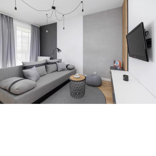 Elegant Apartment in Cracow with Balcony, Parking and Desk by Noclegi Renters