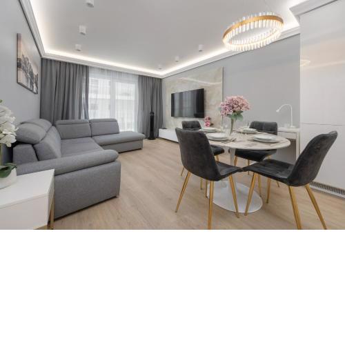 Elegant Apartment with Balcony by the Oder River in Wrocław by Renters Prestige