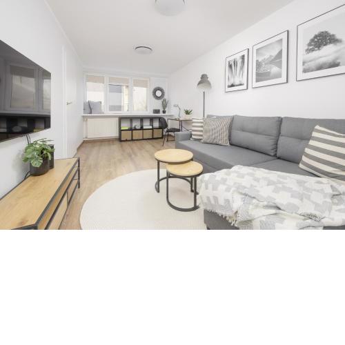 Elegant Grey Apartment Wspólna Śródmieście in Warsaw by Noclegi Renters