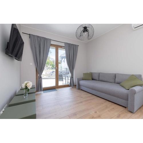 Exceptional Apartment with Parking in Gdynia by Noclegi Renters