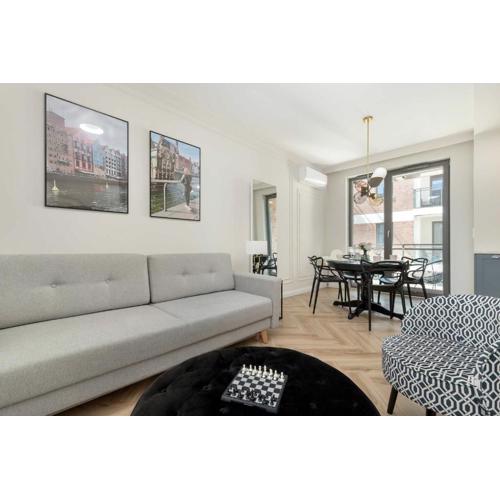 Exclusive Apartment with Parking, Air Conditioning and a Rooftop Terrace in the Centre of Gdańsk by Renters Prestige