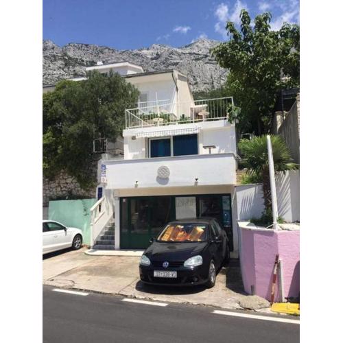 Family-friendly apartments with swimming pools Brela, Makarska - 22910