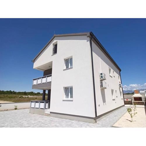 Family-friendly apartments with swimming pools Vrsi - Mulo, Zadar - 24110