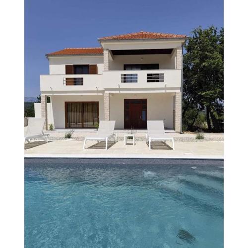 Family friendly house with a swimming pool Posedarje, Novigrad - 23578
