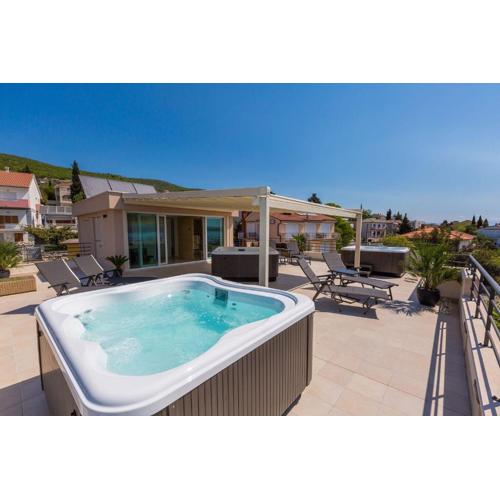 Faszienierendes Apartment nur 100 Meter zum Strand mit Jacuzzi, Sauna, Meerblick