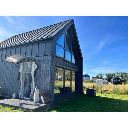 Ferienhaus“ Blaues Wunder“ am Wasser mit Grill