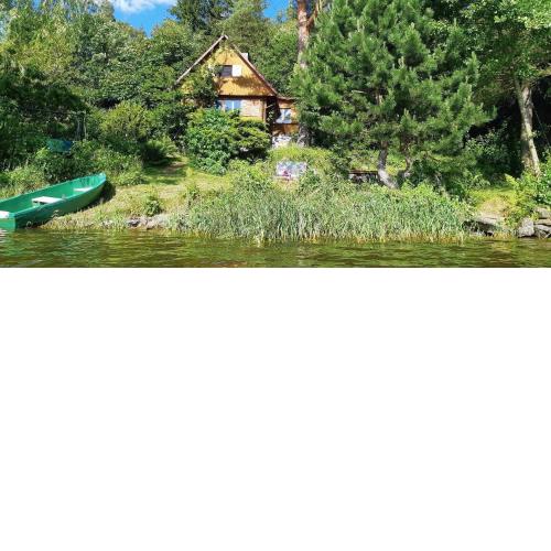Ferienhaus direkt am See mit Garten und Parkplatz