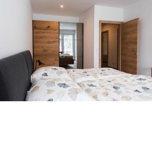 Ferienwohnung Bergsonne mit Sonnenbalkon und Tiefgaragen Parkplatz