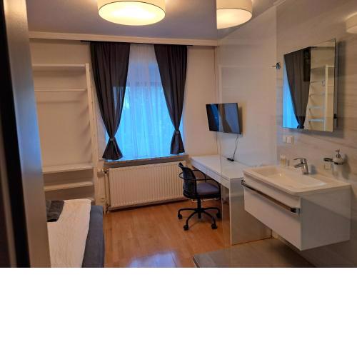 Flataid Gästehaus Graschi - gutes und günsiges Einzelzimmer - Steinbergstraße