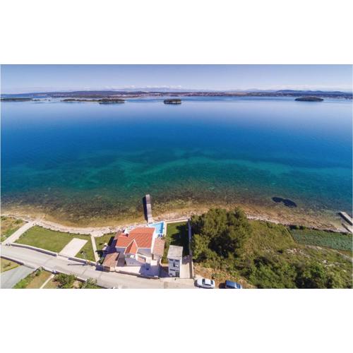 Four-Bedroom Holiday Home In Tkon