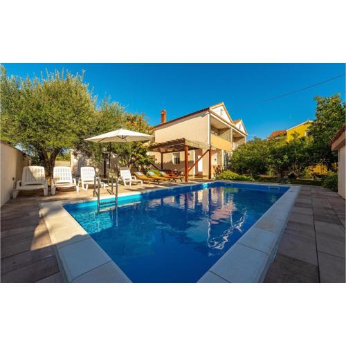 Four-Bedroom Holiday Home In Vrsi
