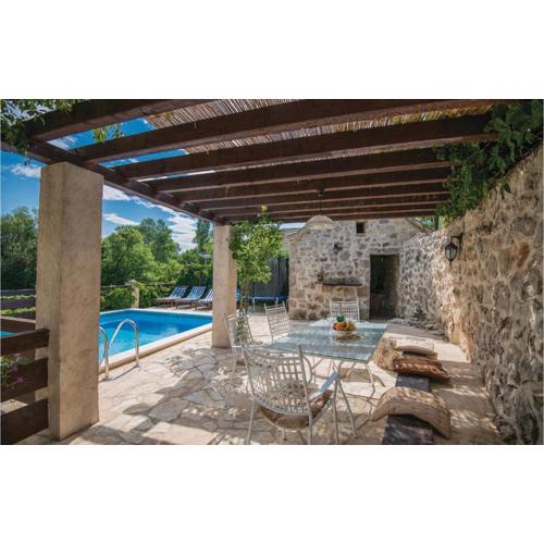 Four-Bedroom Holiday Home Zmijavci With A Fireplace 09