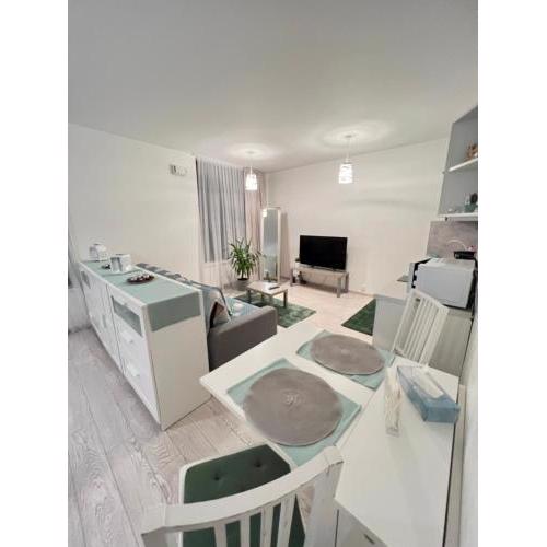 FREE PARKING IN GARAGE Karolina Plazza, new cosy studio with all you need
