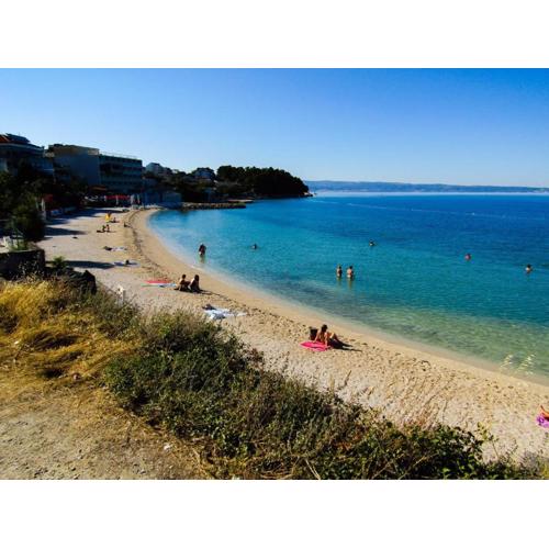 Gemütliche Ferienwohnung mit zwei Balkonen und Gemeinschaftsgarten in Strandnähe