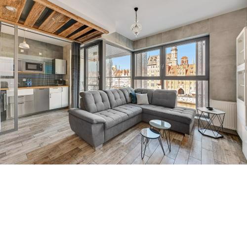 Granaria Premium Riverside & Parking by Downtown Apartments