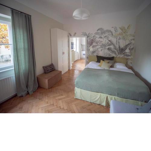 Green flat by GrazRentals with garden view & parking included