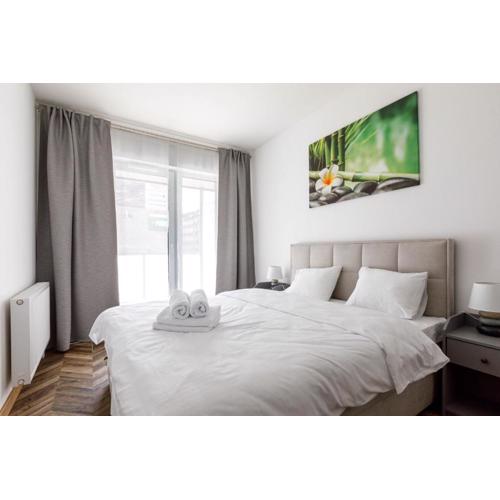 Grey Harmony Apartment by UniqueRent