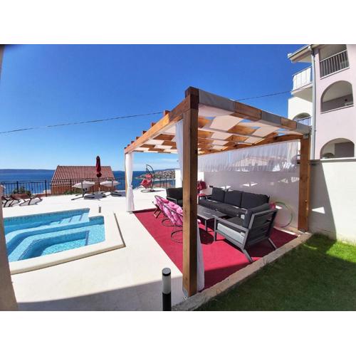 Heated swimming pool with stunning sea view terrace a8