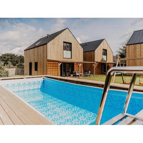 Holiday Home by Lake arnowieckie with Jacuzzi