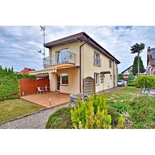 Holiday home with private garden, Grzybowo
