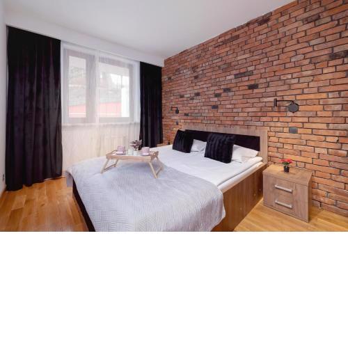 Industrial Apartment Fredry with Parking by Noclegi Renters